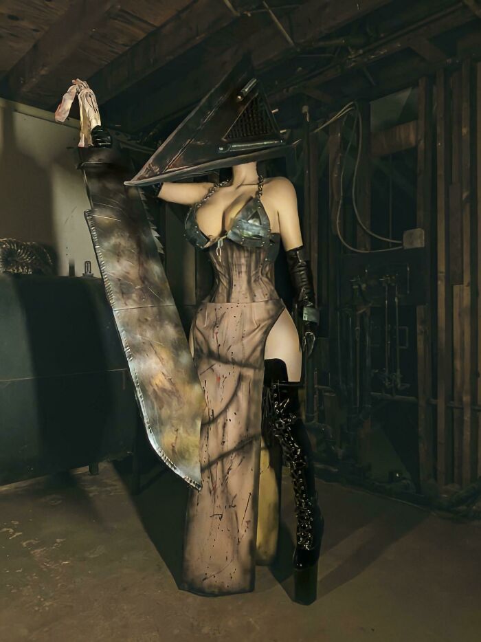 Person cosplaying Pyramid Head from Silent Hill