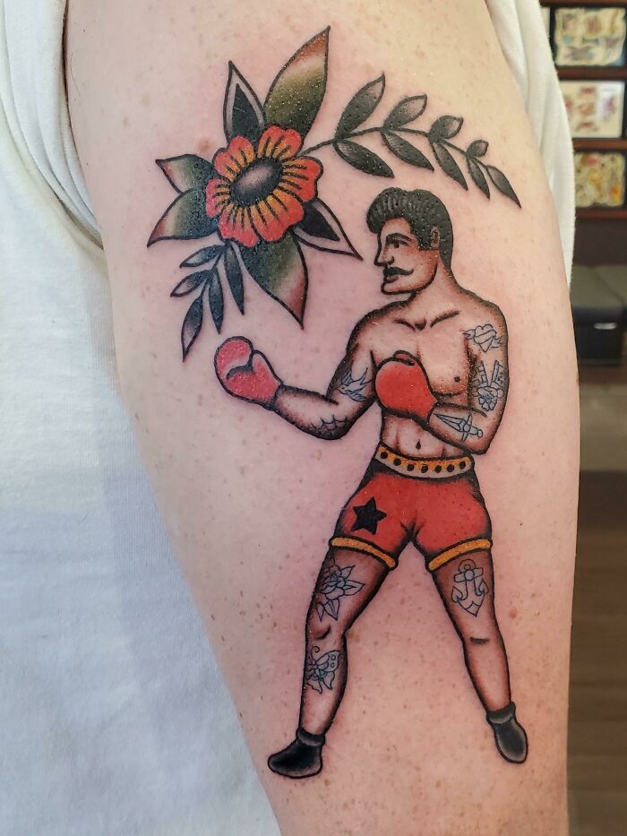 Vintage boxer with florals in an American traditional tattoo design.