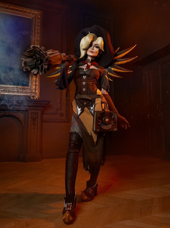 Person cosplaying Witch Mercy from Overwatch
