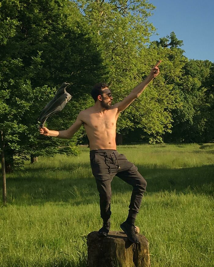 Person swinging his shirt and it looks like crow