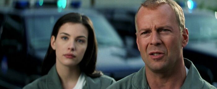 Harry and Grace wearing grey costumes 