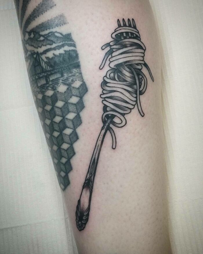 Fork and spaghetti tattoo