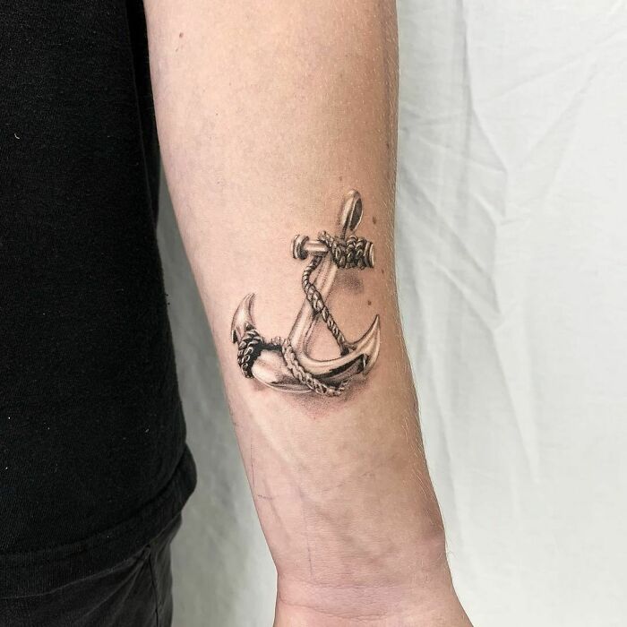 Chrome anchor wrist tattoo