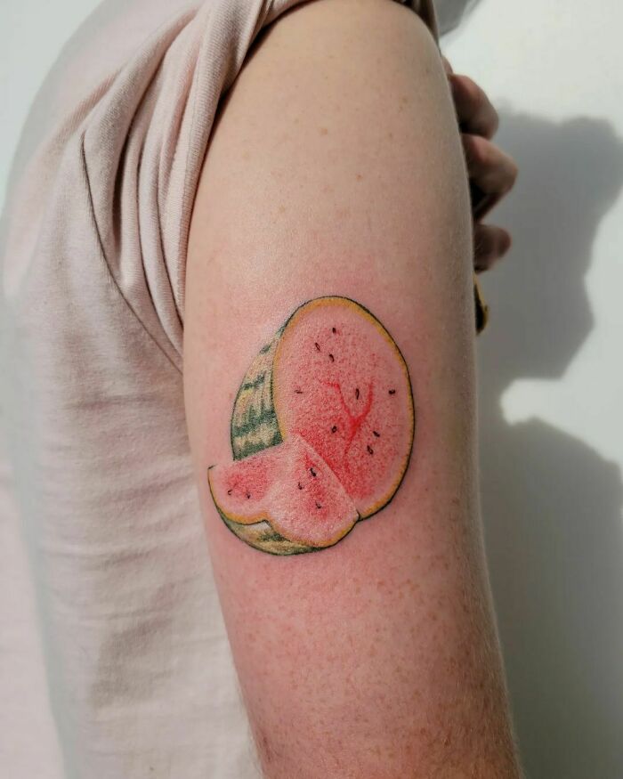Watermelon watercolor arm tattoo