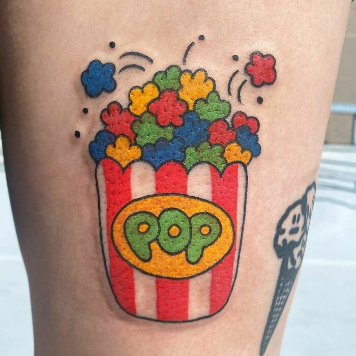 Bag of popcorn watercolor tattoo