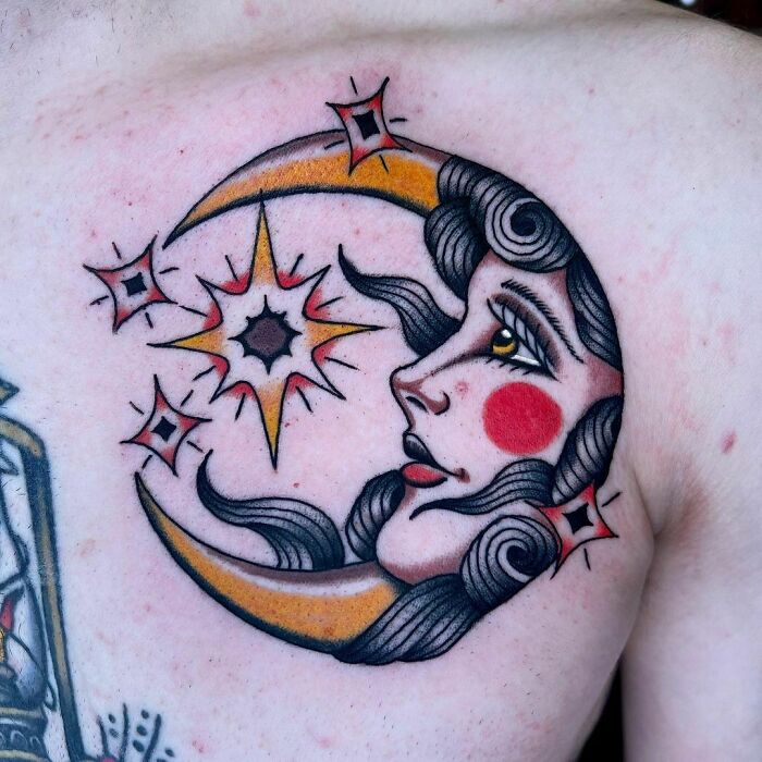 American traditional sun and moon chest tattoo