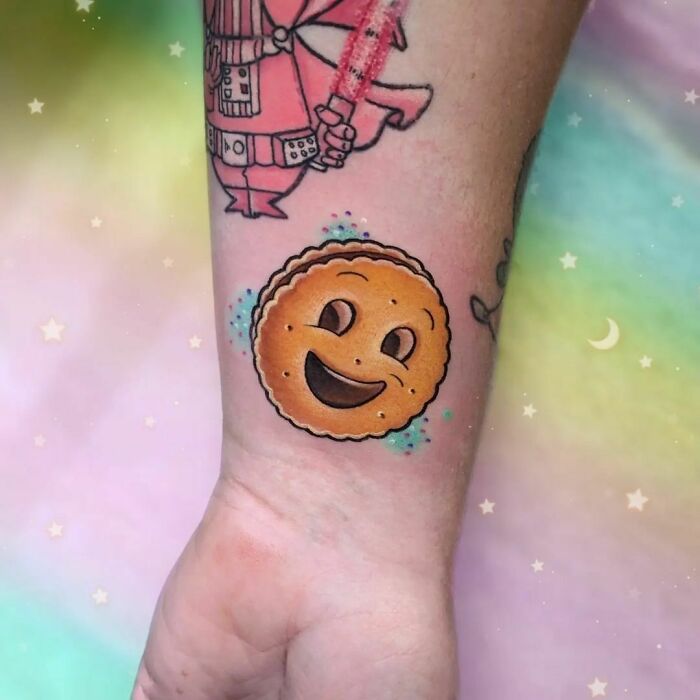 Smiley cookie watercolor tattoo