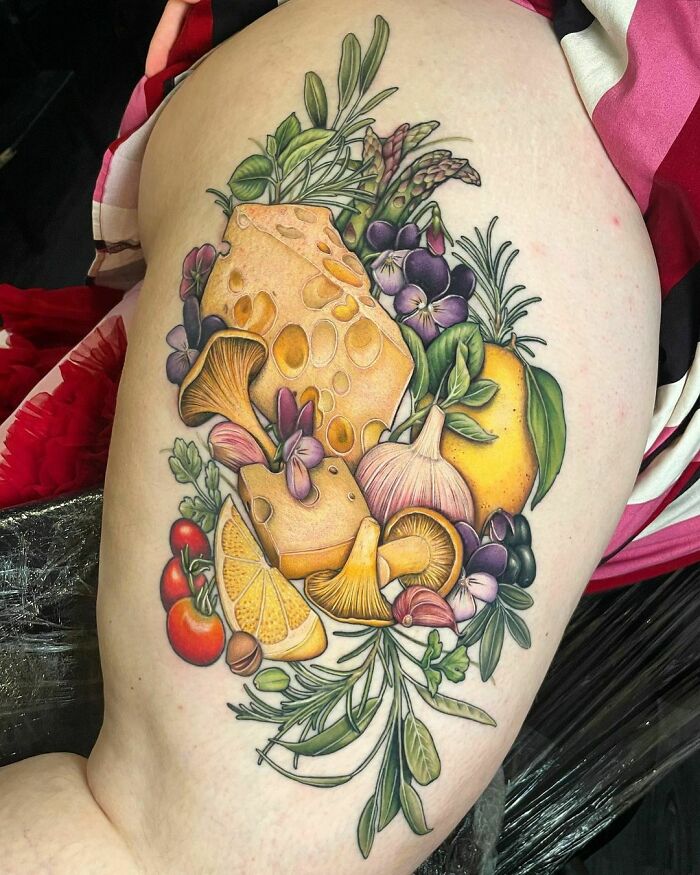 Watercolor vegetables arm tattoo