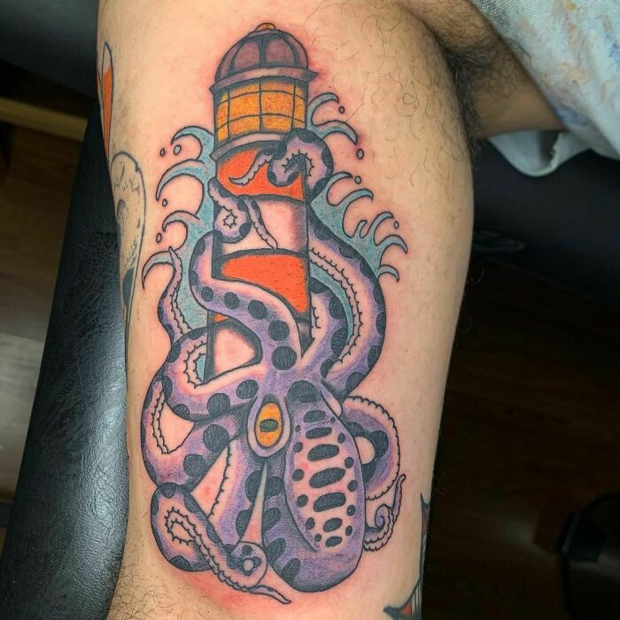 American traditional lighthouse arm tattoo