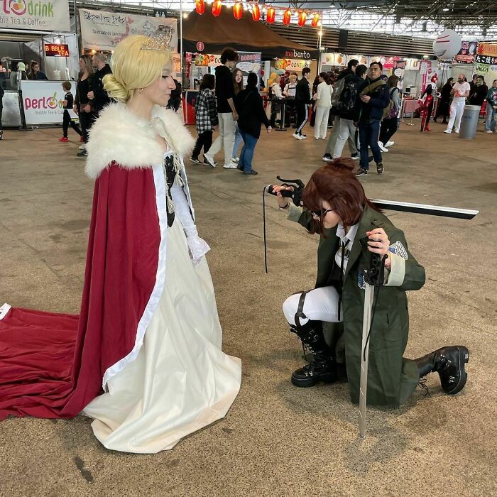 Persons cosplaying Historia Reiss and Hange Zoe from Attack on Titan