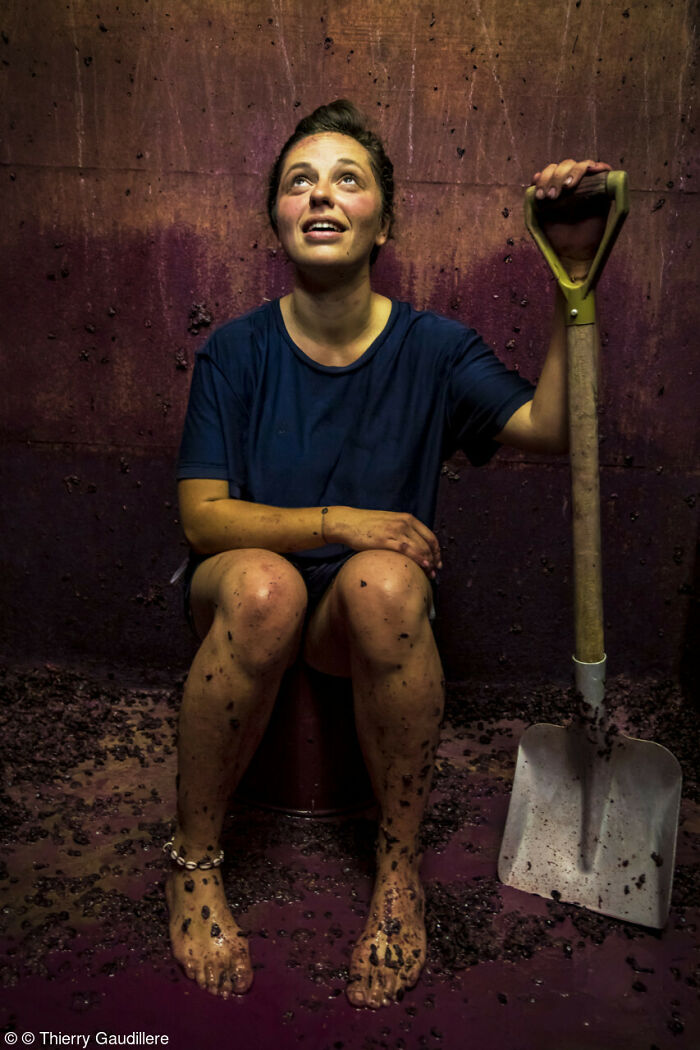 1st Place, Errazuriz Wine Photographer Of The Year - People: Girl After Emptying A Tank At The End Of The Fermentation By Thierry Gaudillère (France)