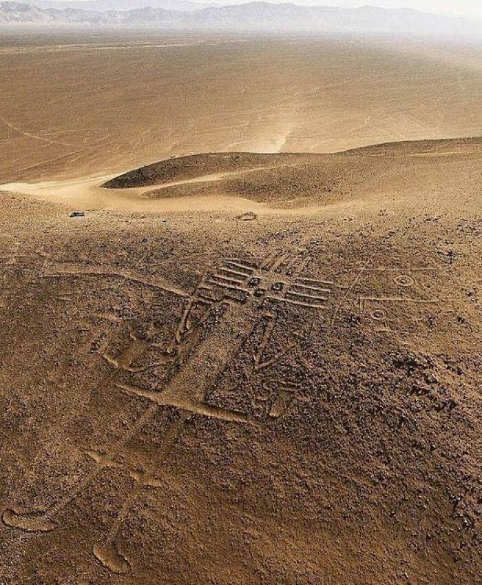 The Atacama Giant, Located In The Expansive Atacama Desert Of Chile, Is A Massive Geoglyph Depicting An Anthropomorphic Figure