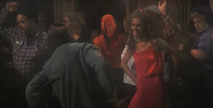 Elaine Dickinson dancing in a club