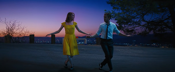 Young couple dancing in the evening with beautiful sky from La La Land movie