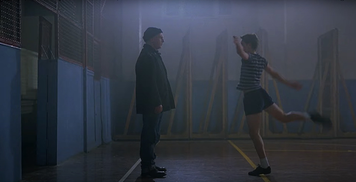 Billy Elliot dances for his father in sports place