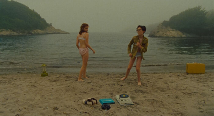 A young couple from Moonrise Kingdom are dancing on the beach