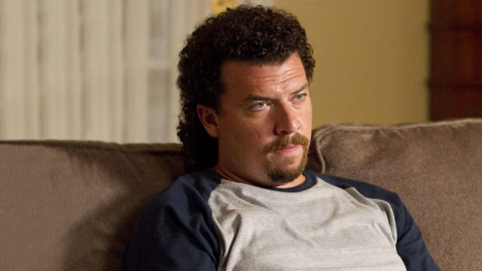 Sad man sitting on couch 