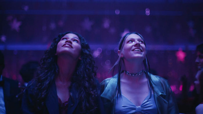 Two girls looking up