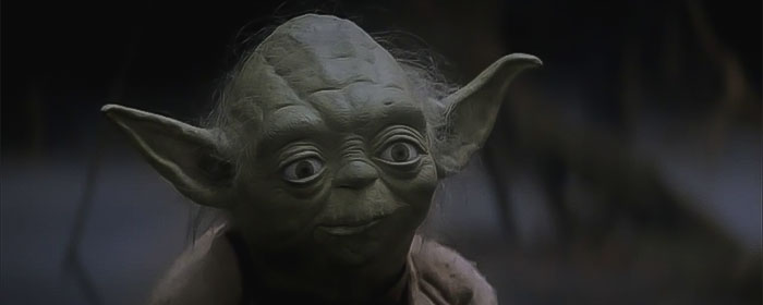 Yoda wearing beige robe 