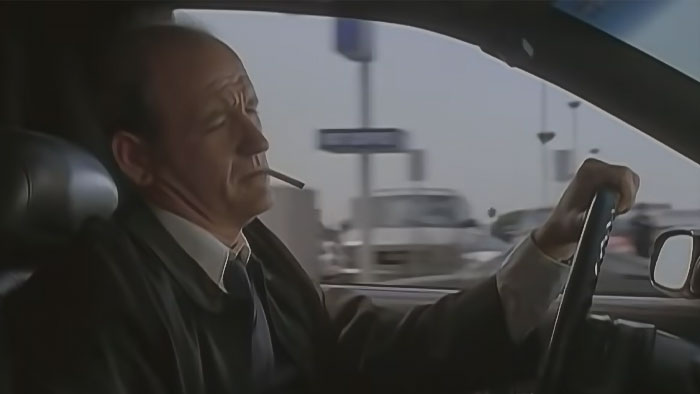 Person driving and smoking from Six Feet Under Pilot