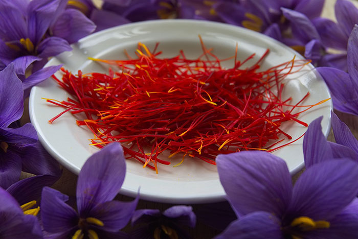 White porcelain late of saffron in the floral background