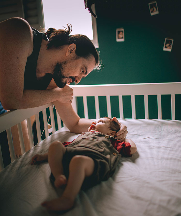 Father Looking at his Baby