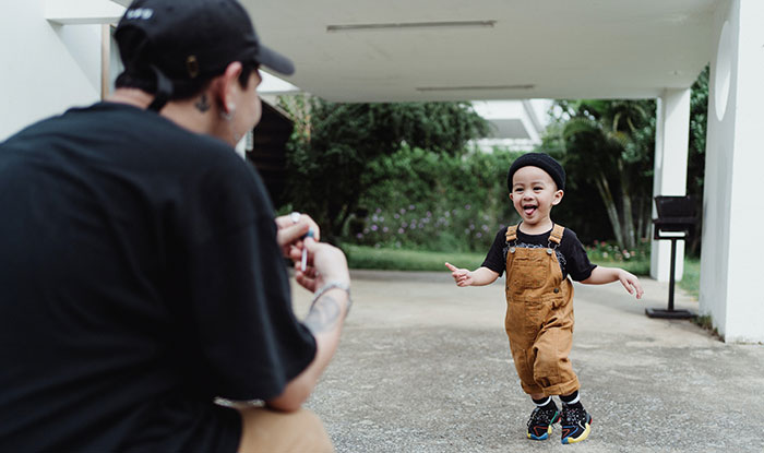 Happy Son Running Towards His Father