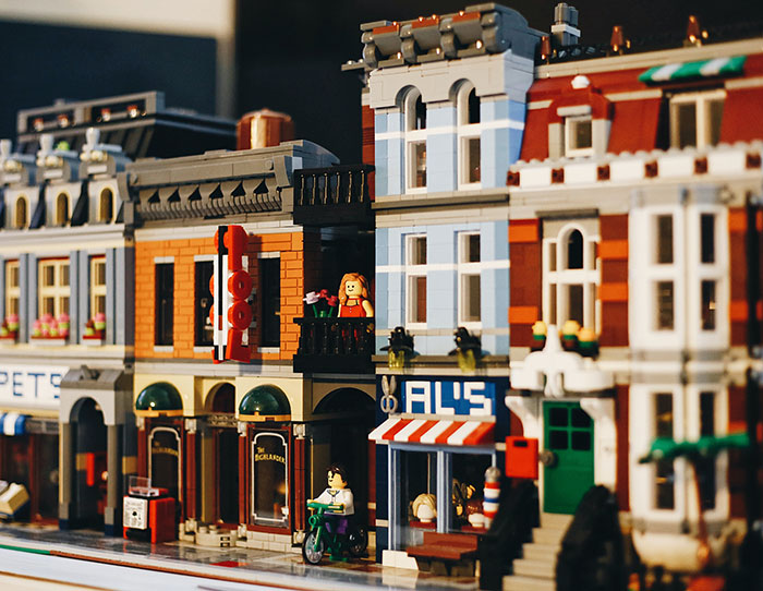 Lego building houses with people