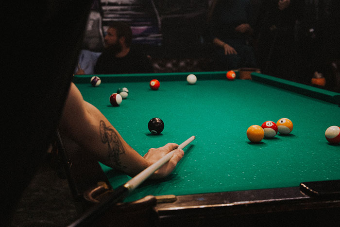 Person playing pool