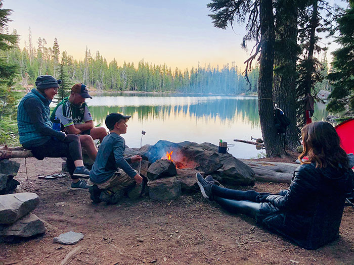 Family camping near lake