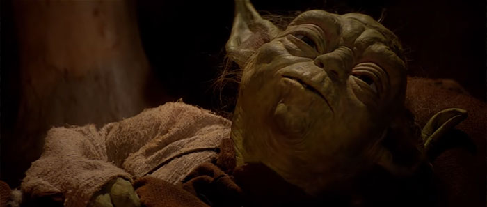 Yoda laying and talking