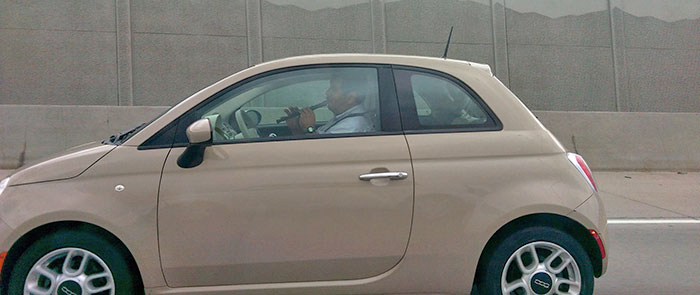Saw This Guy Playing A Recorder While Driving His Fiat On The Highway