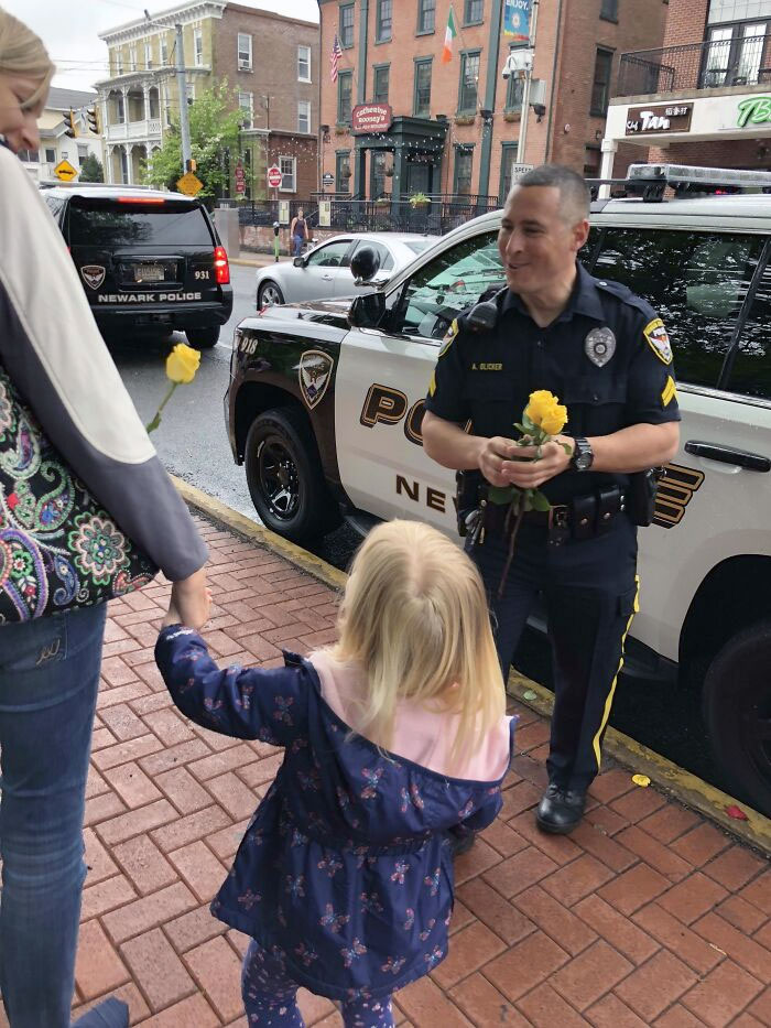 Local PD Hands Out Flowers To All The Moms On Mother's Day