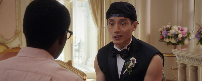 Jason wearing tuxedo without sleeves 