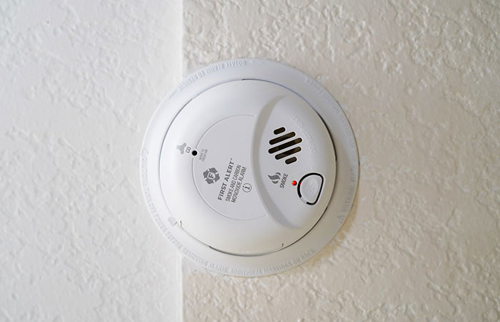Carbon monoxide mounted on white wall