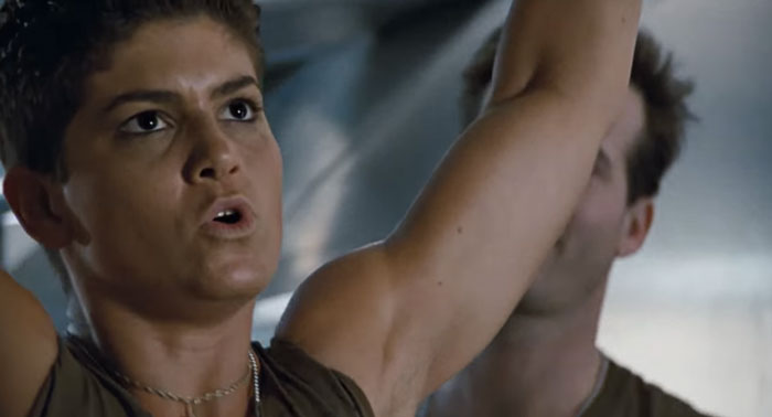 Private Vasquez from Aliens doing pull-ups