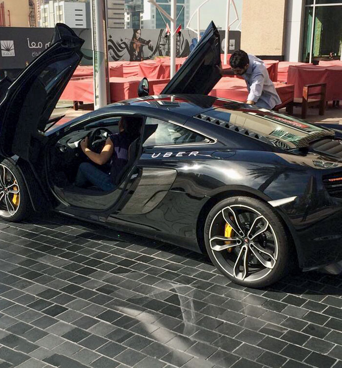 A Friend Sent Me This Photo From His Trip To Dubai. An Uber McLaren Picking Up Someone From Hotel