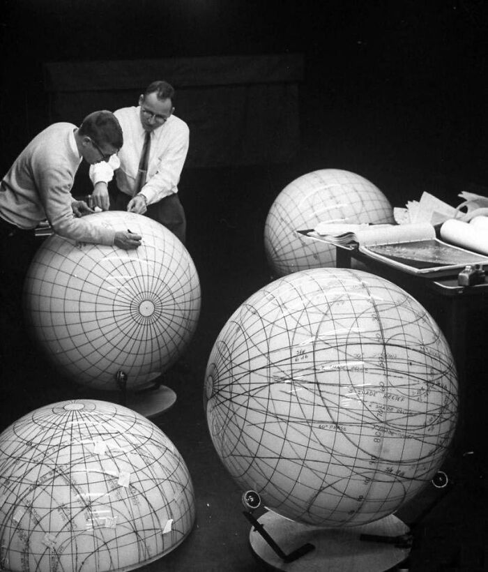Scientists Studying Moon Phases On Models In Preparation For Us Manned Flight To Moon, 1962