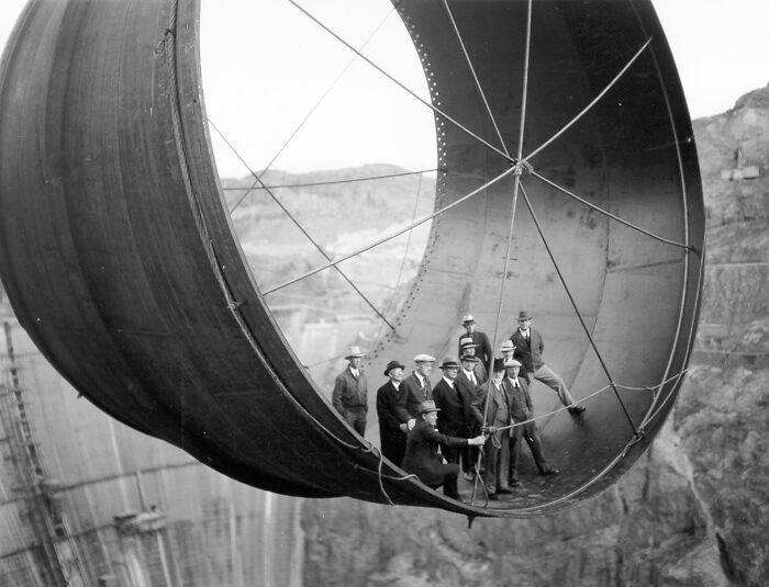 Men Stand In 45-Ton Steel Pipe Over The Hoover Dam, 1935
