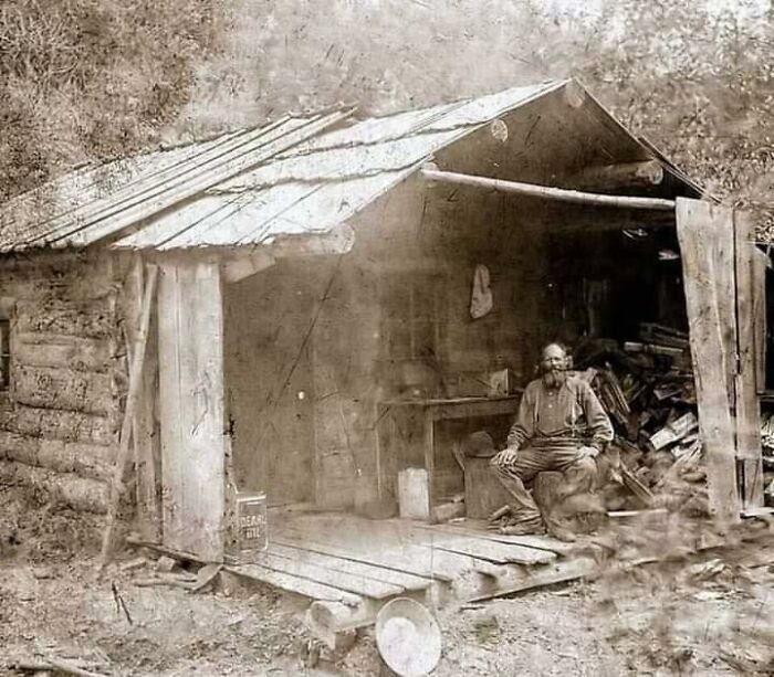 A Man On The Porch Of His Cabin, Eagle Creek, Murray, Idaho, 1889