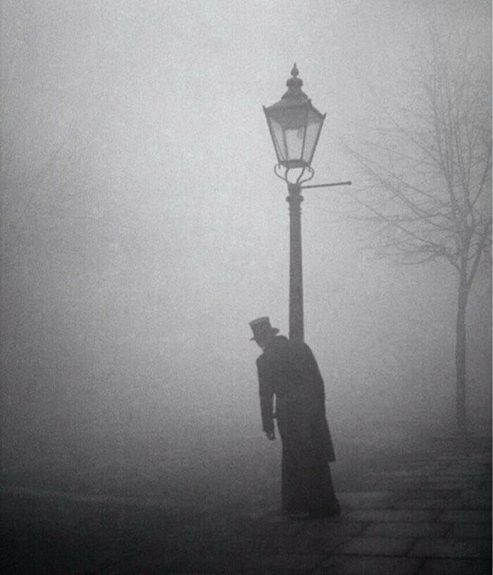 A Drunken Man In Top Hat And Tails Clings To A Lamp-Post, London, 1934