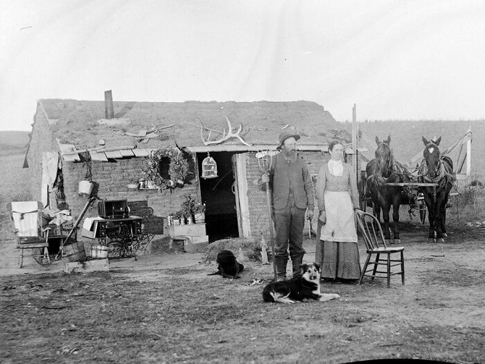 A 19th-Century Family At Their Sod House On The Plains Showing Off Their Goods In The Yard