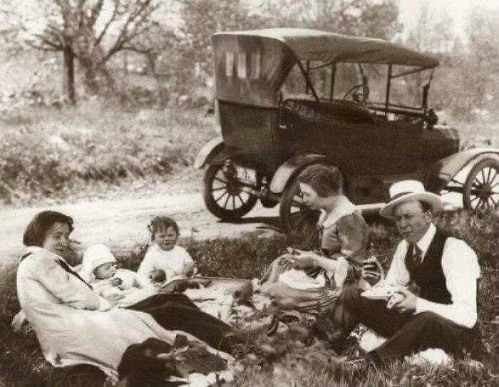Family Having A Picnic By The Side Of The Road With A Model T Ford In The Background, 1918