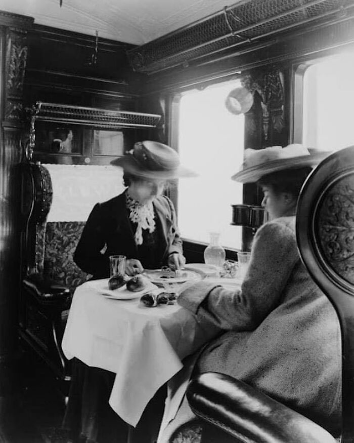 Two Female Passengers Eating A Meal In A Dining Car. England, 1905
