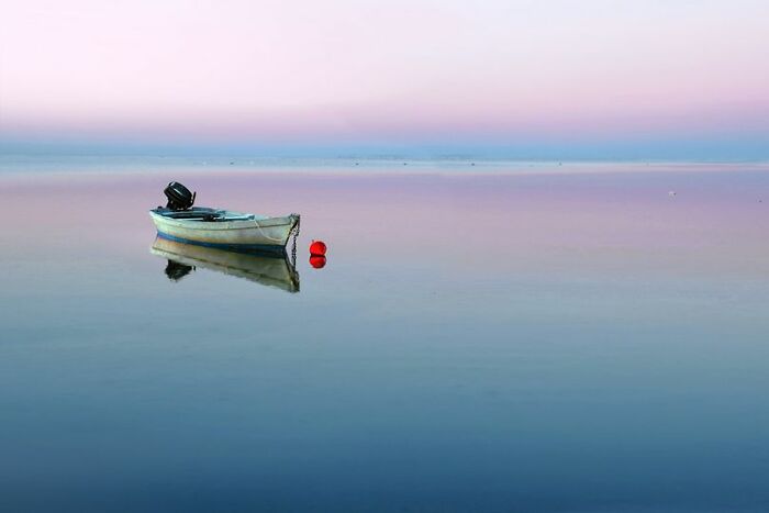 Boat Alone On Sunrise