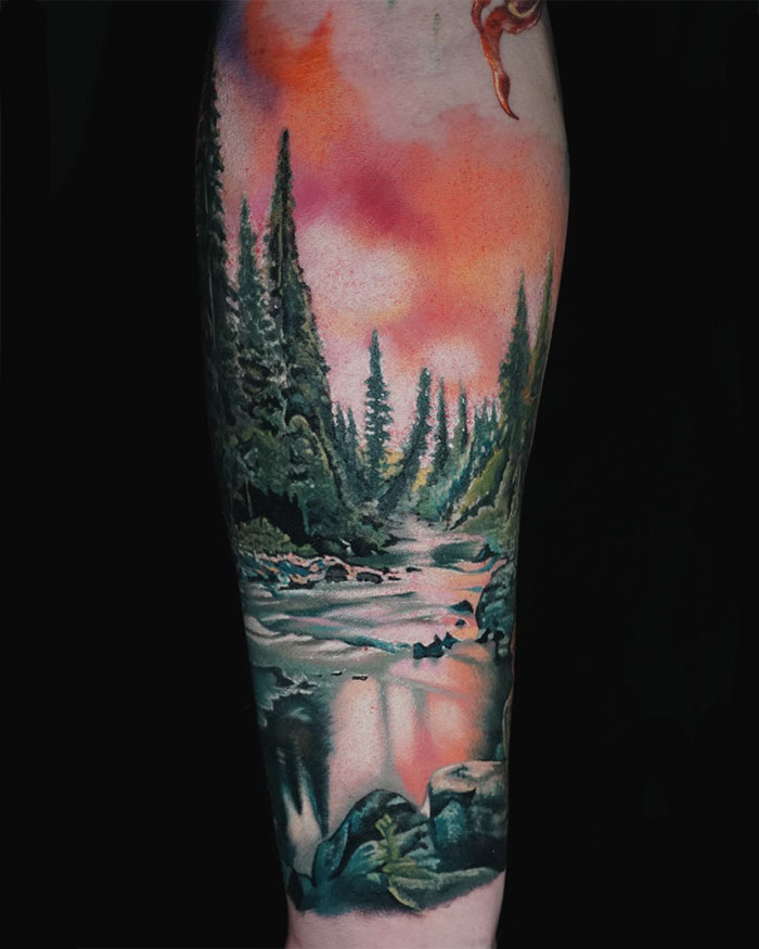 Colorful nature arm tattoo 