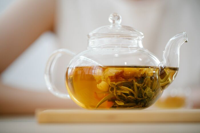 Green tea in a small teapot