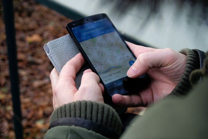 Person using maps on a smartphone 
