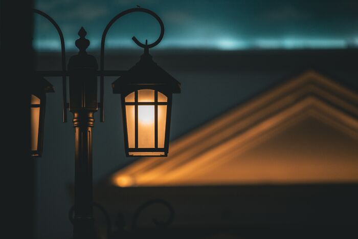 Lit Up Lantern In A Dark Street 