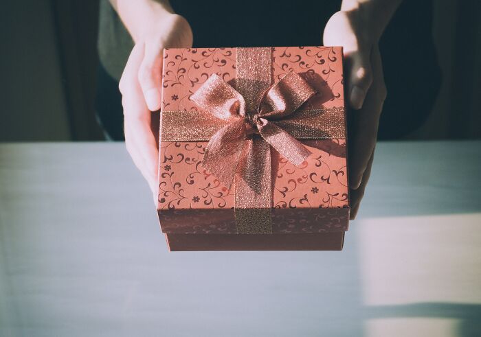 Person holding gift box